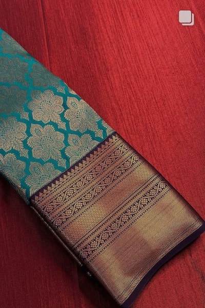 Teal Blue Banarasi Soft Silk Saree with Copper Zari Brocade Jaal and Heavy Woven Border in Surat