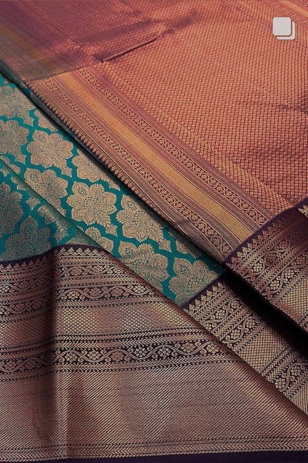 Teal Blue Banarasi Soft Silk Saree with Copper Zari Brocade Jaal and Heavy Woven Border  in Surat