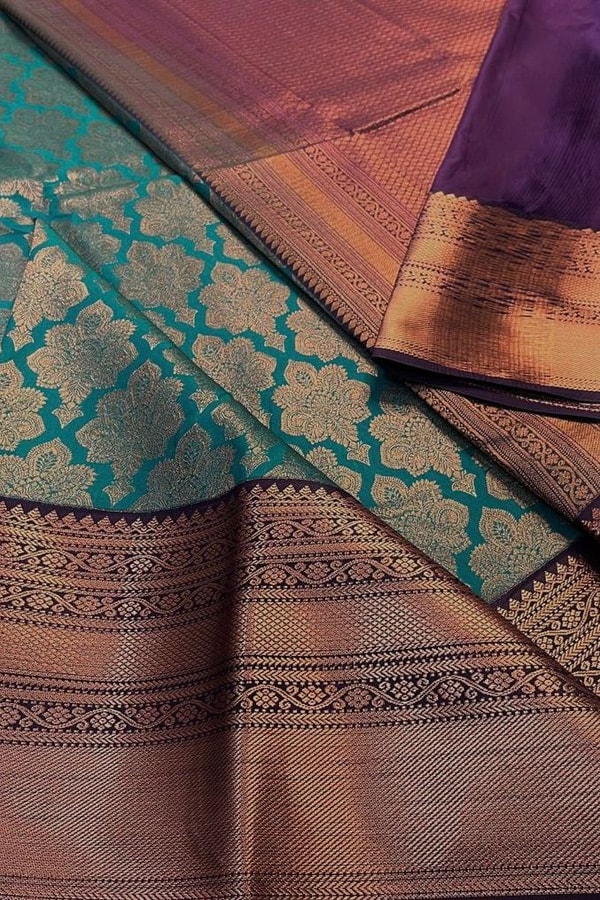 Teal Blue Banarasi Soft Silk Saree with Copper Zari Brocade Jaal and Heavy Woven Border  in Surat