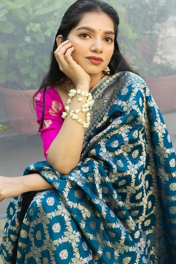 Teal Blue Banarasi Soft Silk Saree with Silver Zari Ikat-Style Geometric Motifs  in Surat