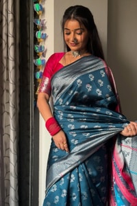 Teal Blue Banarasi Soft Silk Saree with Silver Zari Motifs and Contrast Pink Woven Pallu  in Surat