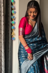 Teal Blue Banarasi Soft Silk Saree with Silver Zari Motifs and Contrast Pink Woven Pallu  in Surat