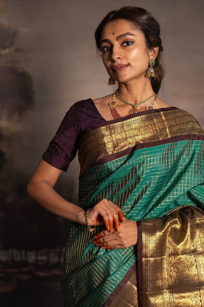 Teal Green Banarasi Soft Silk Saree with Contrast Purple Border and Heavy Gold Zari Pallu in Surat