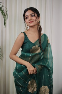 Teal Green Saree with Gold Zari Stripes, Large Floral Motifs and Woven Gold Pallu  in Surat