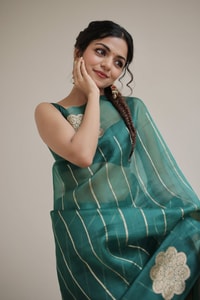 Teal Green Saree with Gold Zari Stripes, Large Floral Motifs and Woven Gold Pallu  in Surat
