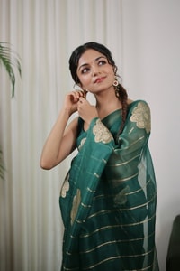Teal Green Saree with Gold Zari Stripes, Large Floral Motifs and Woven Gold Pallu  in Surat