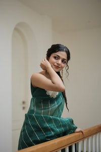 Teal Green Saree with Gold Zari Stripes, Large Floral Motifs and Woven Gold Pallu  in Surat