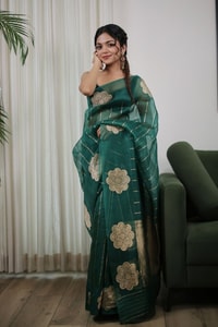 Teal Green Saree with Gold Zari Stripes, Large Floral Motifs and Woven Gold Pallu  in Surat