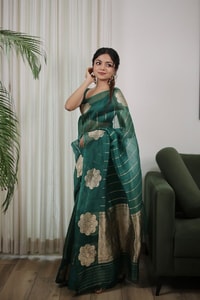 Teal Green Saree with Gold Zari Stripes, Large Floral Motifs and Woven Gold Pallu  in Surat