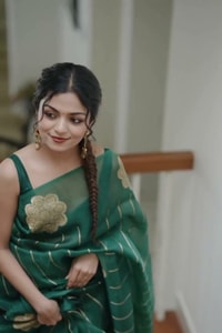 Teal Green Saree with Gold Zari Stripes, Large Floral Motifs and Woven Gold Pallu  in Surat video 1