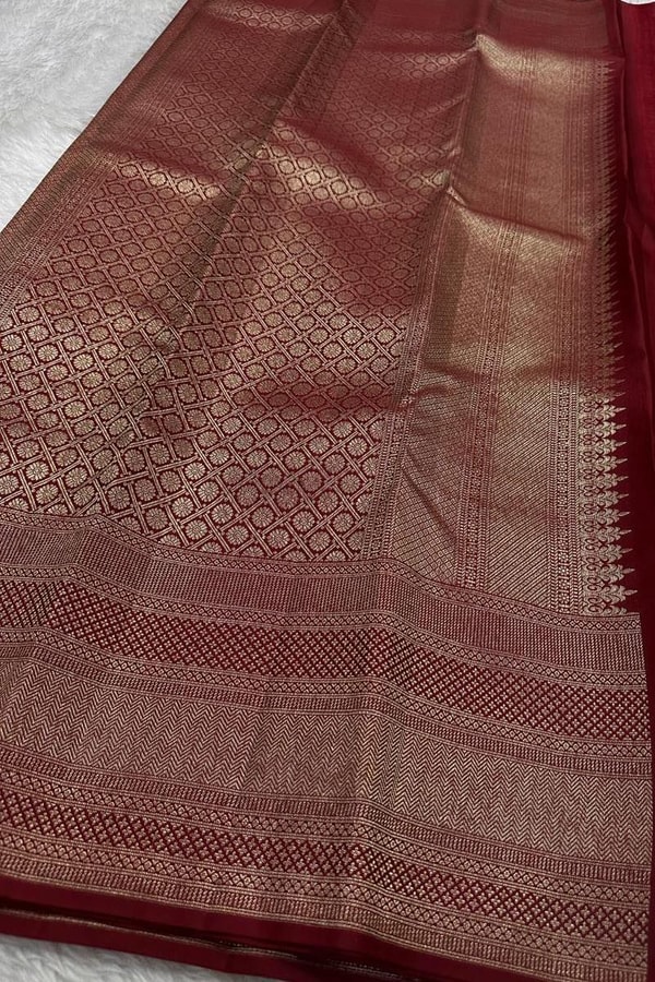 Tone-on-Tone Banarasi Soft Silk Saree with Antique Zari Geometric Jaal in Maroon and Red  in Surat