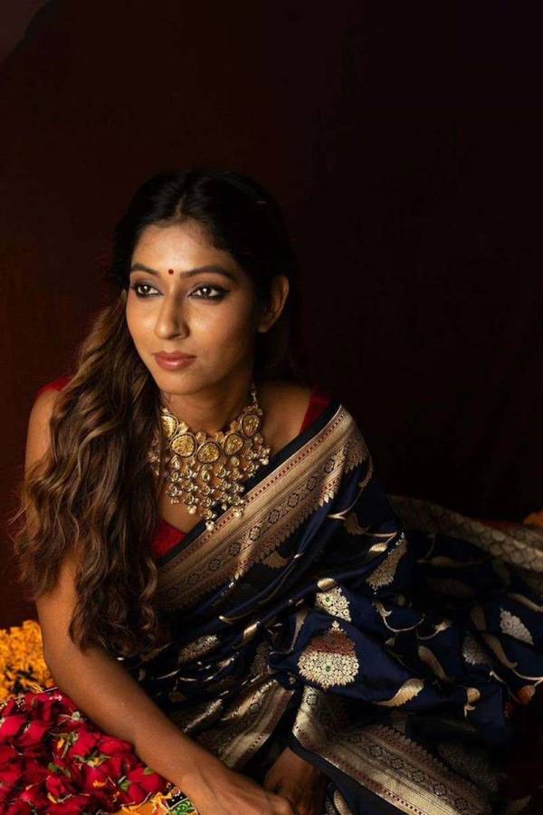 Traditional Navy Blue Saree with Elegant Golden Motifs  in Surat