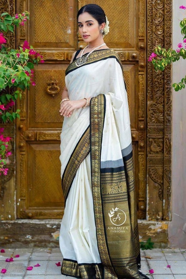 White Banarasi Soft Silk Saree with Black and Gold Zari Border and Golden Pallu  in Surat