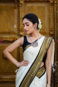 White Banarasi Soft Silk Saree with Black and Gold Zari Border and Golden Pallu  in Surat