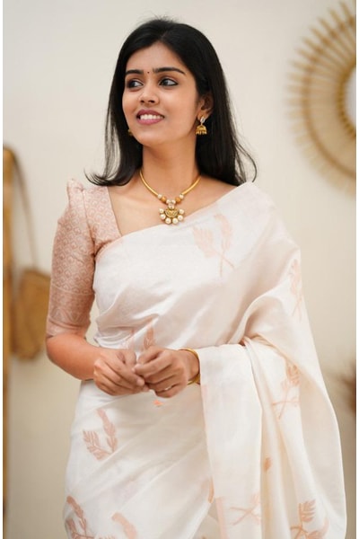 White Banarasi Soft Silk Saree with Copper Zari Leaf Buttis and Peach Woven Pallu in Surat