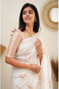 White Banarasi Soft Silk Saree with Copper Zari Leaf Buttis and Peach Woven Pallu  in Surat