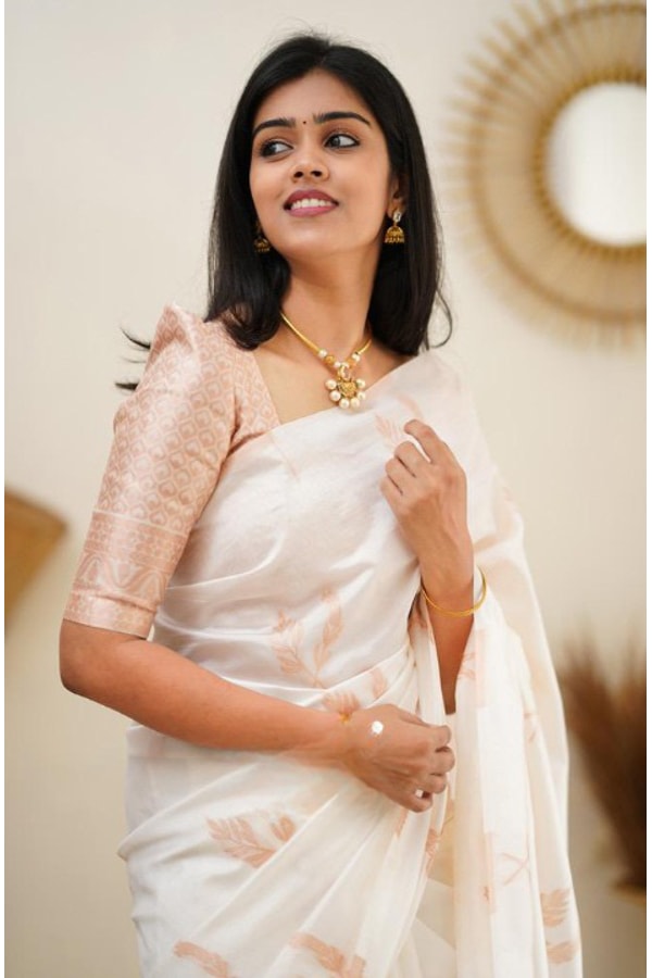 White Banarasi Soft Silk Saree with Copper Zari Leaf Buttis and Peach Woven Pallu  in Surat