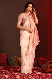 White Banarasi Soft Silk Saree with Copper Zari Leaf Buttis and Peach Woven Pallu  in Surat