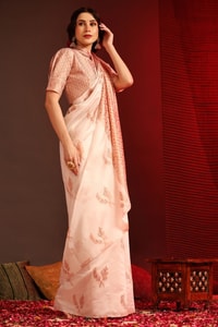 White Banarasi Soft Silk Saree with Copper Zari Leaf Buttis and Peach Woven Pallu  in Surat