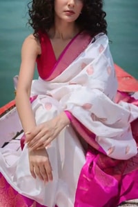 White Banarasi Soft Silk Saree with Rani Pink Border and Pink Zari Buttas  in Surat
