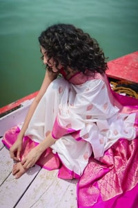 White Banarasi Soft Silk Saree with Rani Pink Border and Pink Zari Buttas  in Surat video 1
