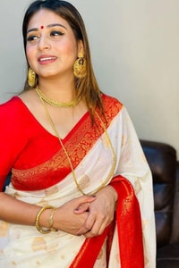 White Banarasi Soft Silk Saree with Red or Coral Zari Border, Pallu and Gold Butis  in Surat