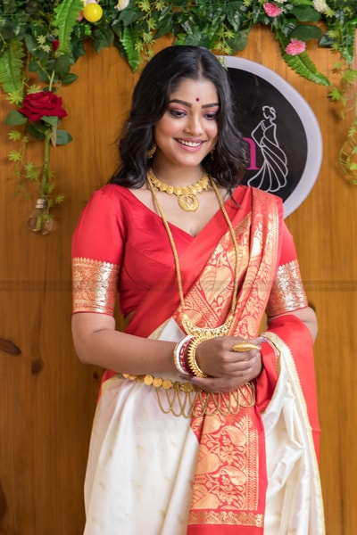 White and Red Bengali Style Banarasi Soft Silk Saree with Red Zari Border and Woven Pallu in Surat
