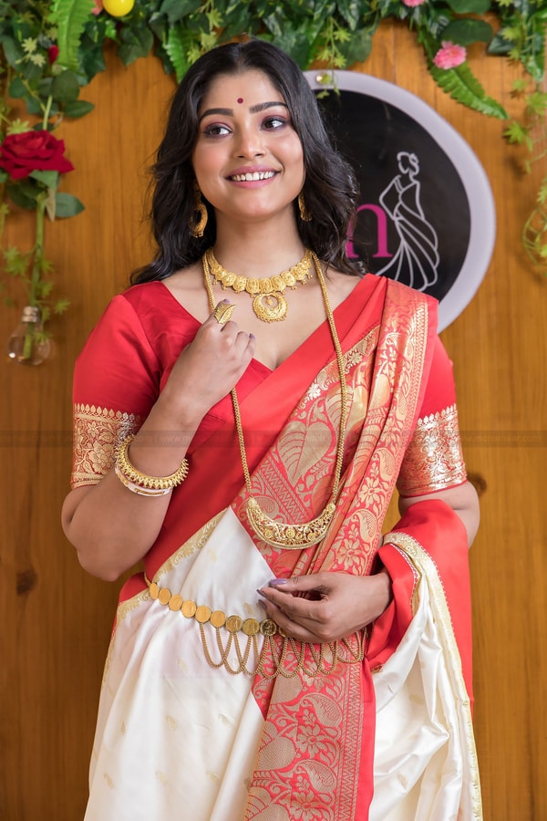 White and Red Bengali Style Banarasi Soft Silk Saree with Red Zari Border and Woven Pallu  in Surat