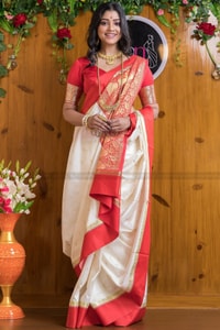 White and Red Bengali Style Banarasi Soft Silk Saree with Red Zari Border and Woven Pallu  in Surat