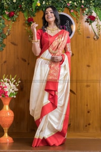 White and Red Bengali Style Banarasi Soft Silk Saree with Red Zari Border and Woven Pallu  in Surat