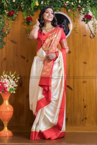 White and Red Bengali Style Banarasi Soft Silk Saree with Red Zari Border and Woven Pallu  in Surat