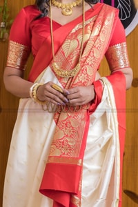 White and Red Bengali Style Banarasi Soft Silk Saree with Red Zari Border and Woven Pallu  in Surat