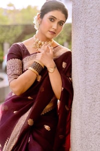 Wine Banarasi Soft Silk Saree with Scattered Gold Zari Buttis and Broad Antique Gold Border  in Surat