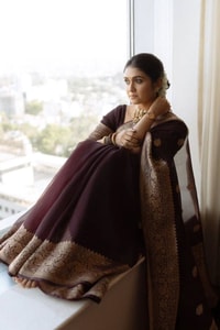 Wine Banarasi Soft Silk Saree with Scattered Gold Zari Buttis and Broad Antique Gold Border  in Surat