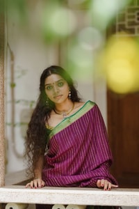 Wine Pinstripe Banarasi Soft Silk Saree with Contrast Green Zari Border and Striped Pallu  in Surat