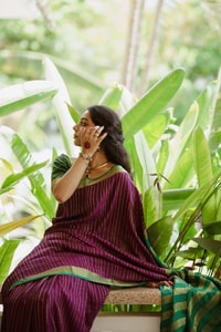 Wine Pinstripe Banarasi Soft Silk Saree with Contrast Green Zari Border and Striped Pallu  in Surat