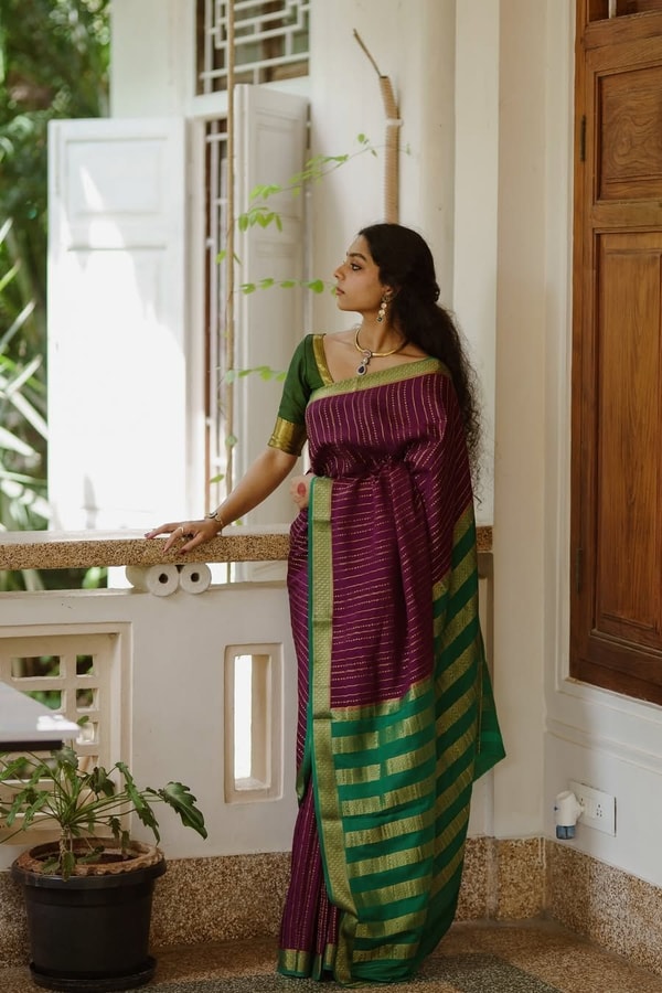 Wine Pinstripe Banarasi Soft Silk Saree with Contrast Green Zari Border and Striped Pallu  in Surat