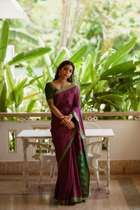 Wine Pinstripe Banarasi Soft Silk Saree with Contrast Green Zari Border and Striped Pallu  in Surat