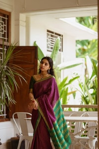 Wine Pinstripe Banarasi Soft Silk Saree with Contrast Green Zari Border and Striped Pallu  in Surat