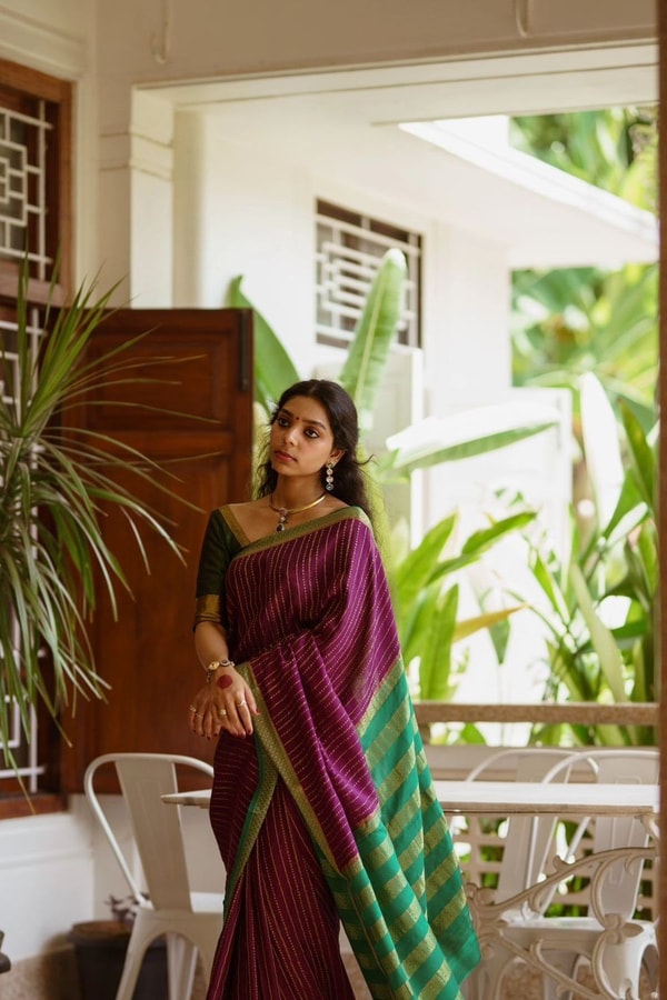 Wine Pinstripe Banarasi Soft Silk Saree with Contrast Green Zari Border and Striped Pallu  in Surat