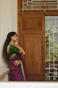 Wine Pinstripe Banarasi Soft Silk Saree with Contrast Green Zari Border and Striped Pallu  in Surat