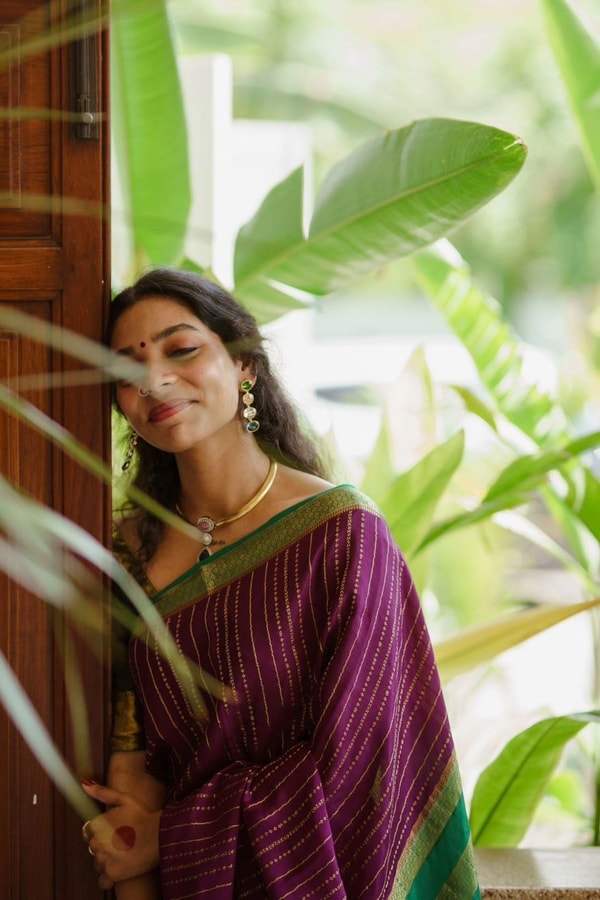 Wine Pinstripe Banarasi Soft Silk Saree with Contrast Green Zari Border and Striped Pallu  in Surat