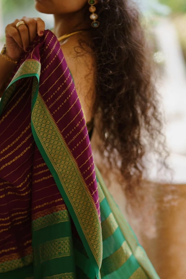 Wine Pinstripe Banarasi Soft Silk Saree with Contrast Green Zari Border and Striped Pallu  in Surat