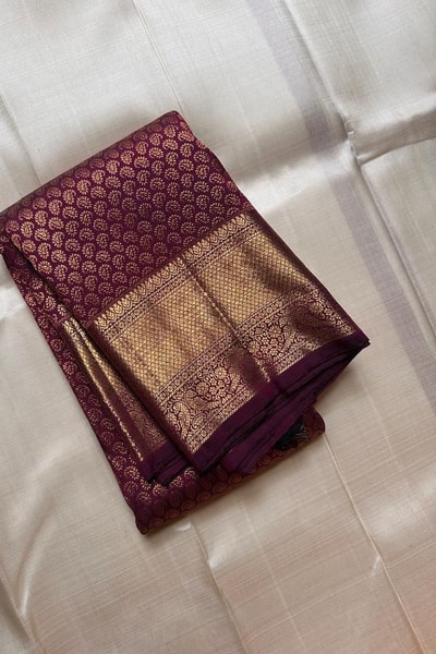 Wine Purple Banarasi Soft Silk Saree with Dense Zari Brocade Body and Broad Gold Border in Surat