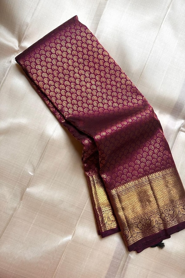 Wine Purple Banarasi Soft Silk Saree with Dense Zari Brocade Body and Broad Gold Border  in Surat
