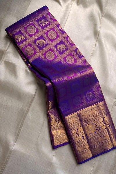 Zari Checks Banarasi Soft Silk Saree with Wide Temple Border in Purple, Teal, Rani and Red in Surat
